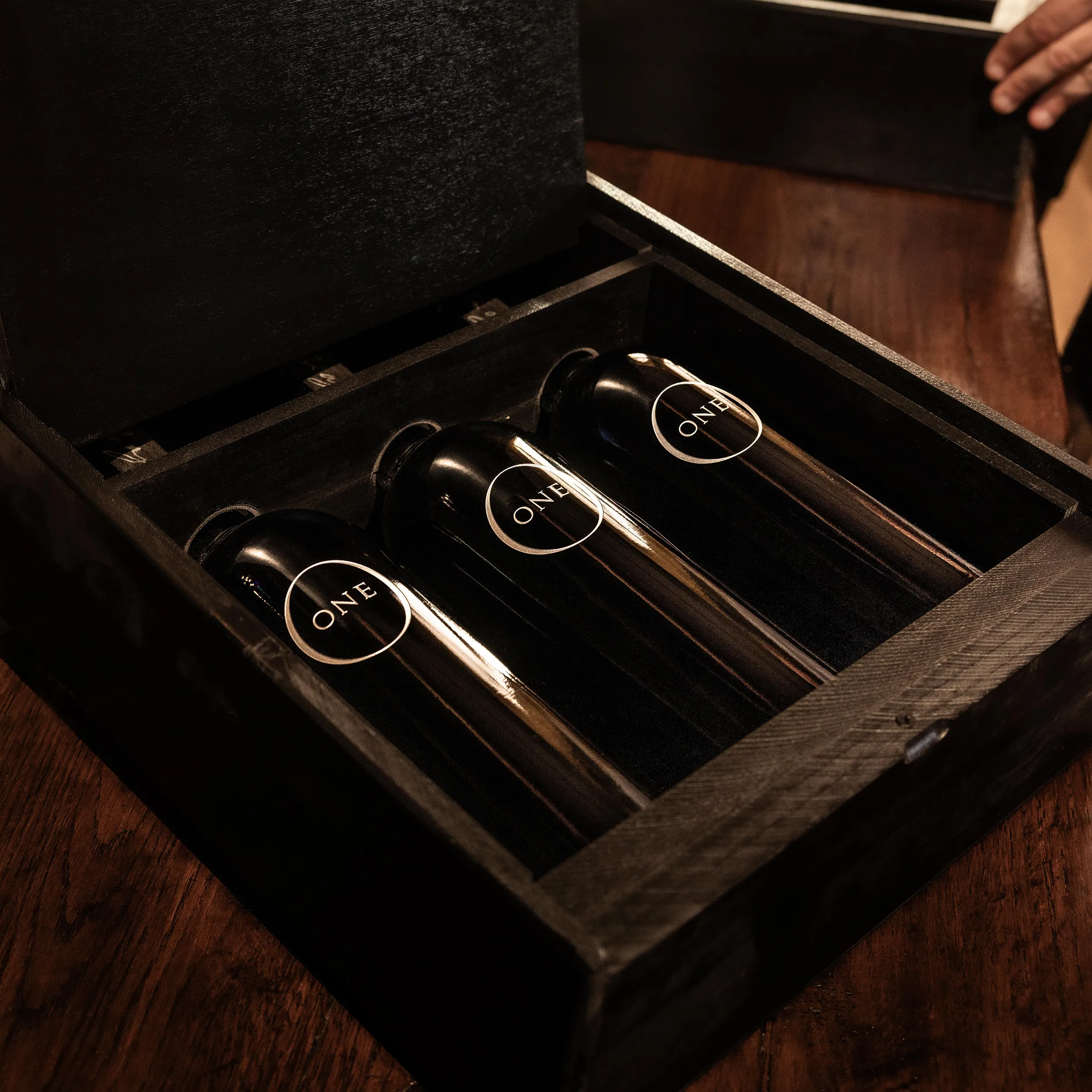 John Anthony Vineyard wine bottles in a case